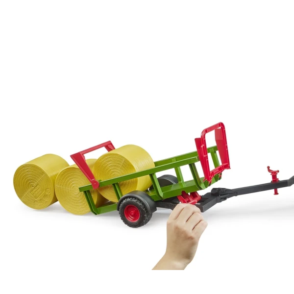 BRUDER DUMP TRAILER WITH 3 ROUND STRAW BALES