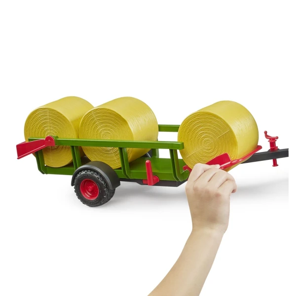 BRUDER DUMP TRAILER WITH 3 ROUND STRAW BALES