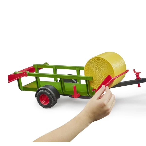 BRUDER DUMP TRAILER WITH 3 ROUND STRAW BALES